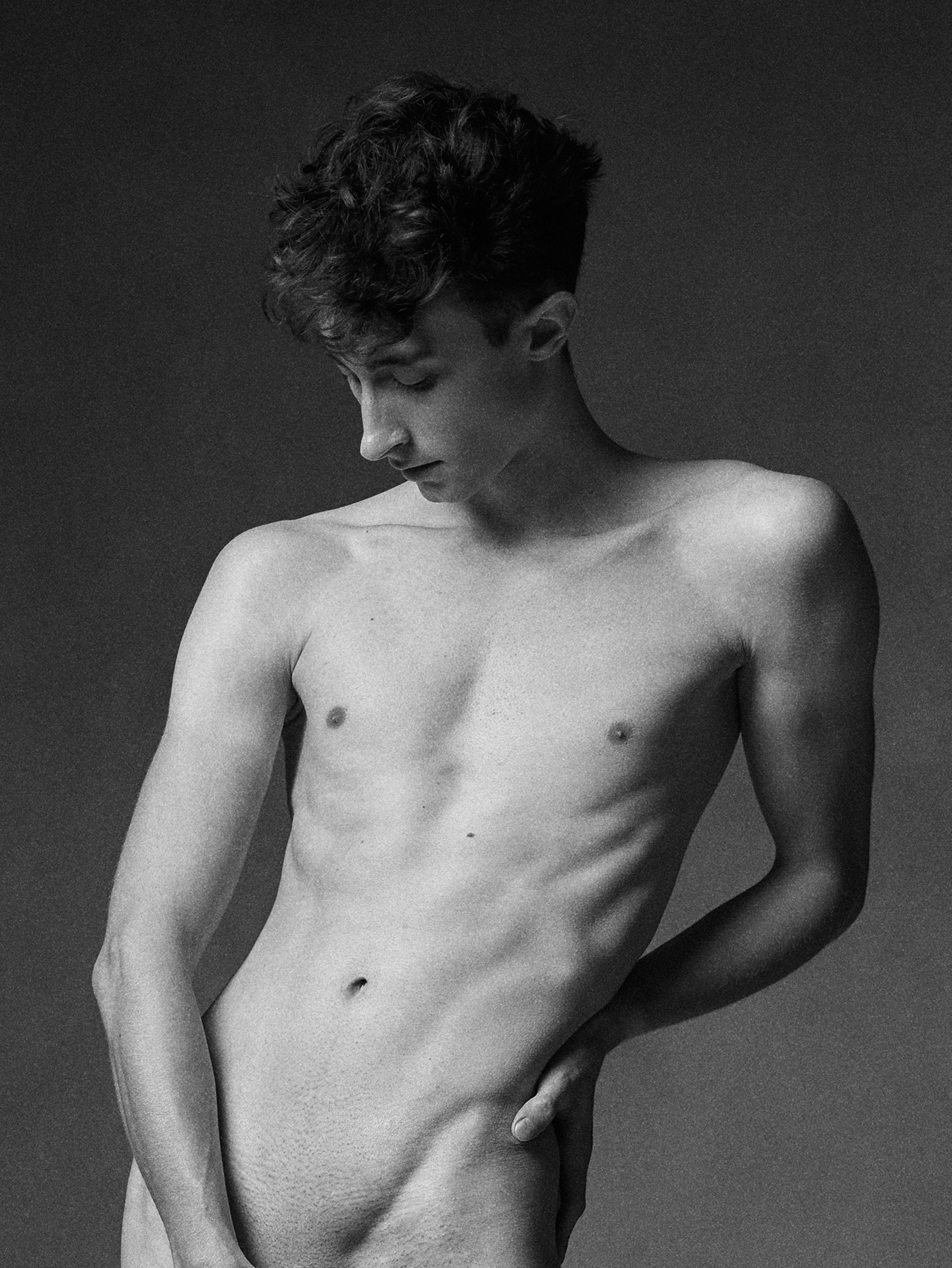 In Stillness — high-contrast B&W exploring the male form, a HeyBoy Exclusive.