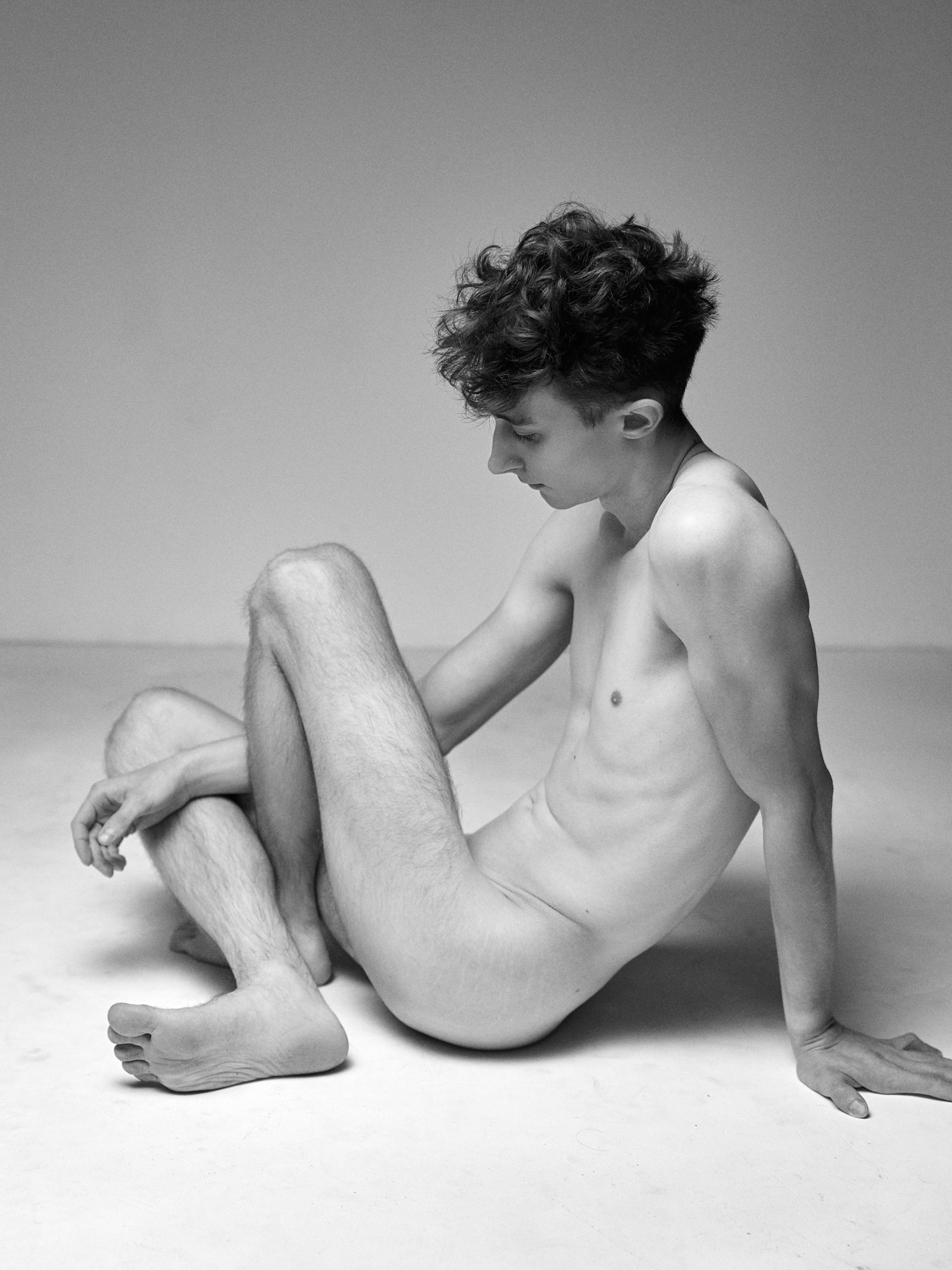 In Stillness — high-contrast B&W exploring the male form, a HeyBoy Exclusive.