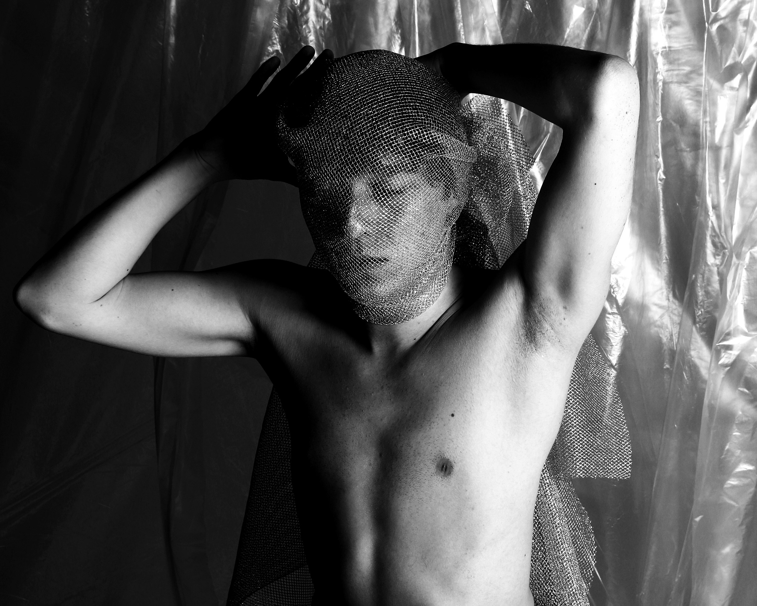 Minimal black and white studio portraits focusing on posture, texture, and the male form against simple backdrops — BLUEBOY, HeyBoy Fanzine