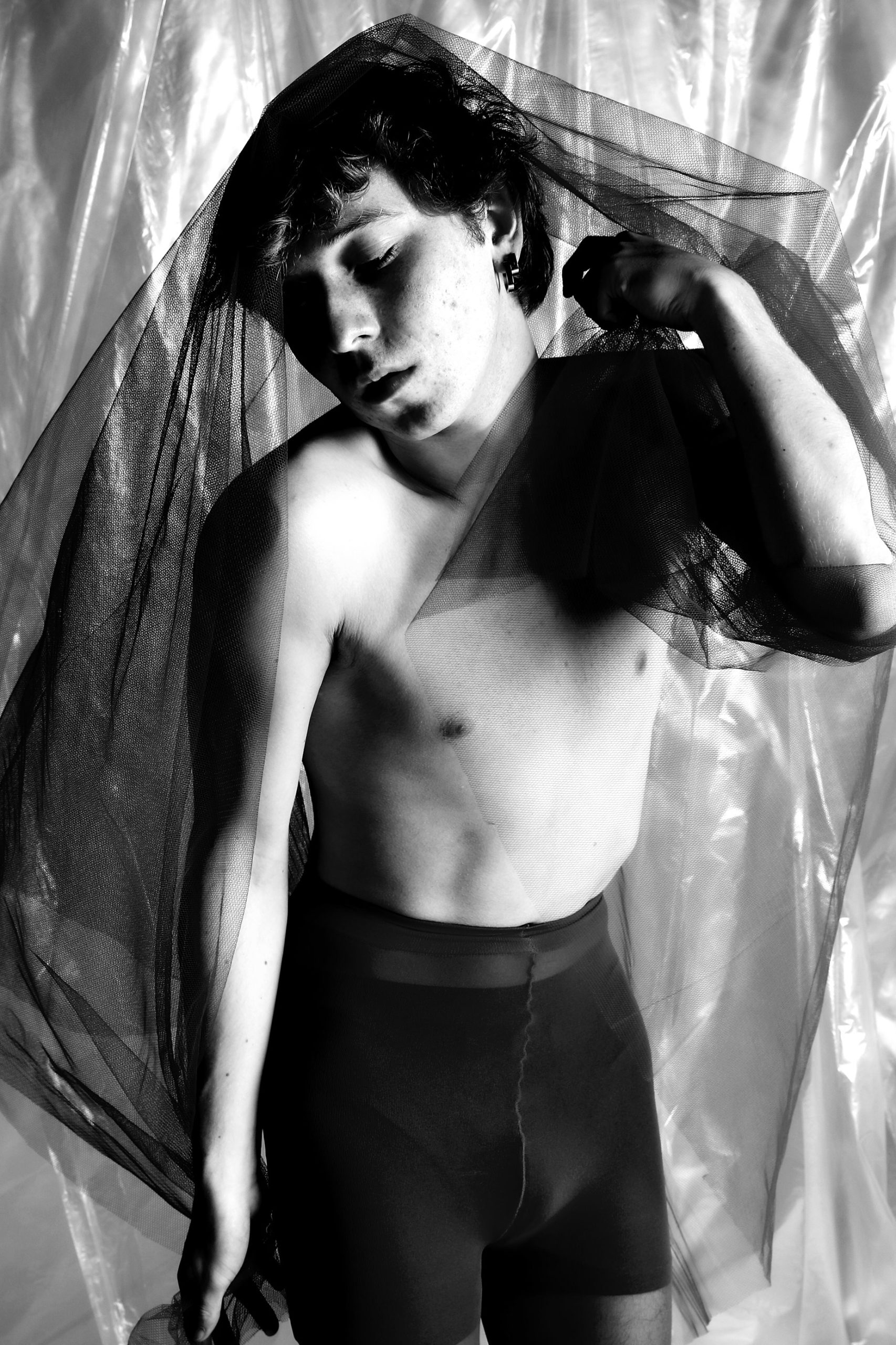 BLUEBOY — HeyBoy Fanzine exclusive editorial featuring intimate close-ups, bare skin, and translucent materials in a quiet studio setting.